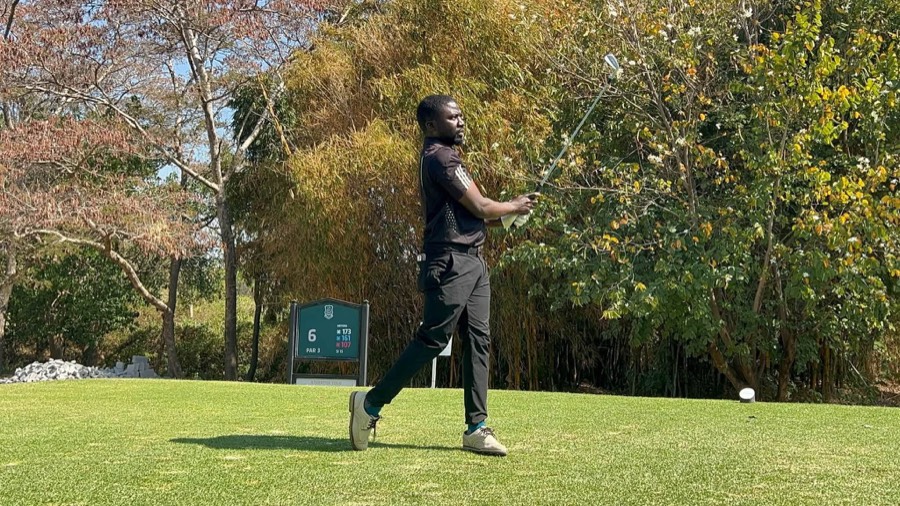 A golfer on the fairway during a Bogey Free round