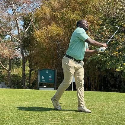 Golfers and caddies during a Sunday round